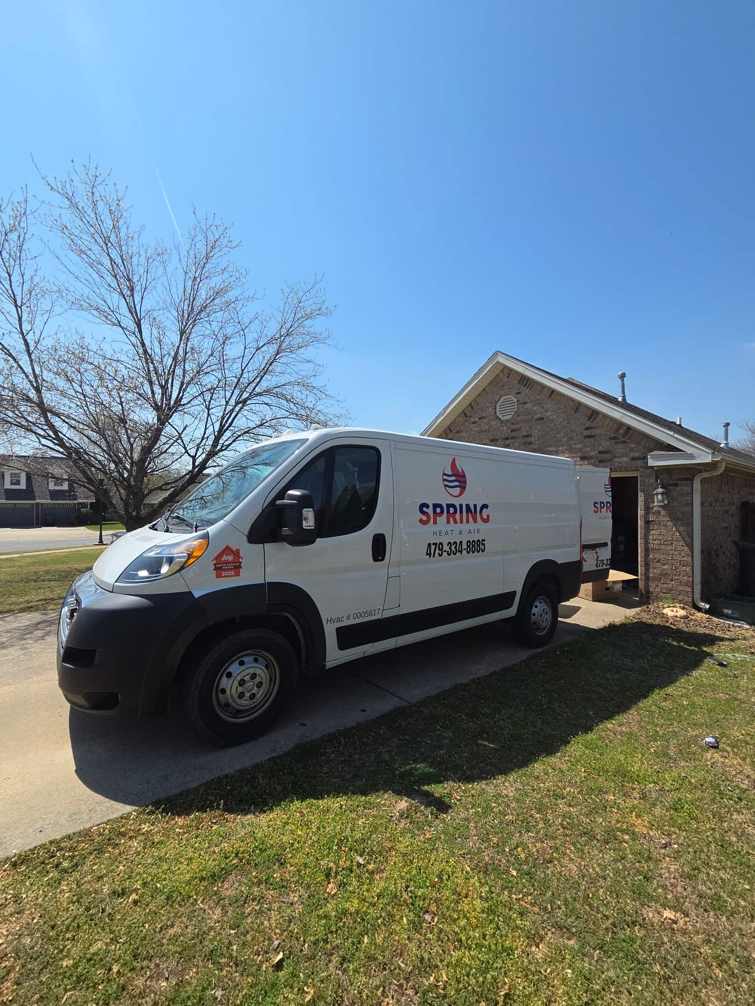 Company van parked for a Spring Heat and Air job